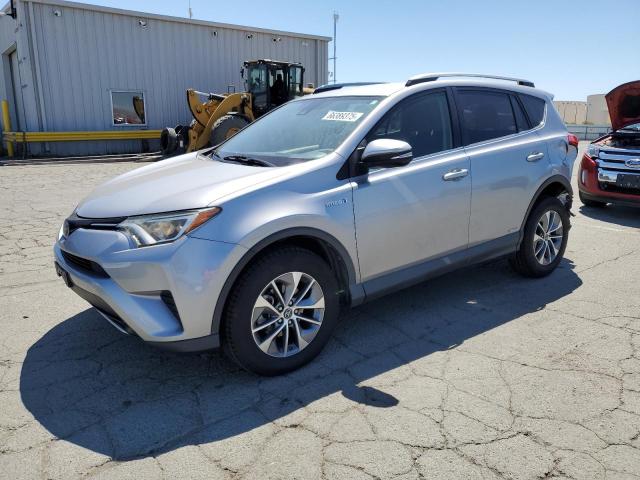 TOYOTA RAV4 HV LE 2018 silver  hybrid engine JTMRJREV4JD191204 photo #1