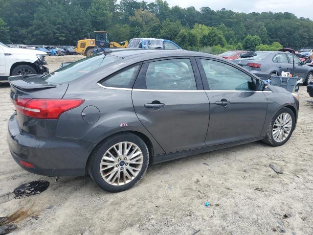 2015 FORD FOCUS TITA 1FADP3J21FL360776