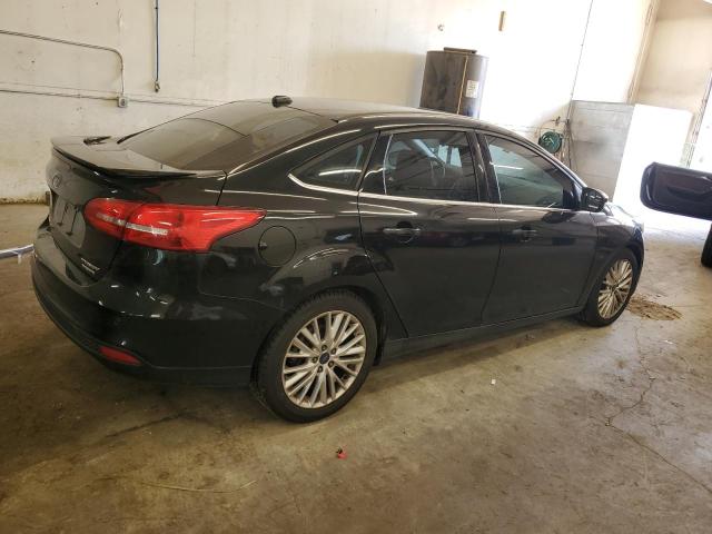 2015 FORD FOCUS TITA 1FADP3J24FL348993
