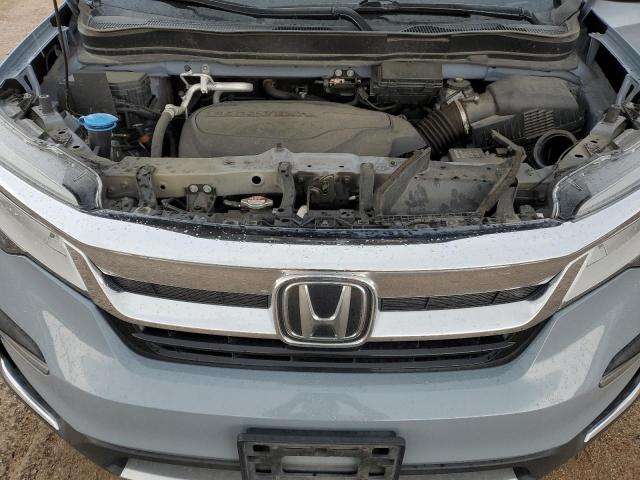 2022 HONDA PILOT TOUR 5FNYF6H60NB042061