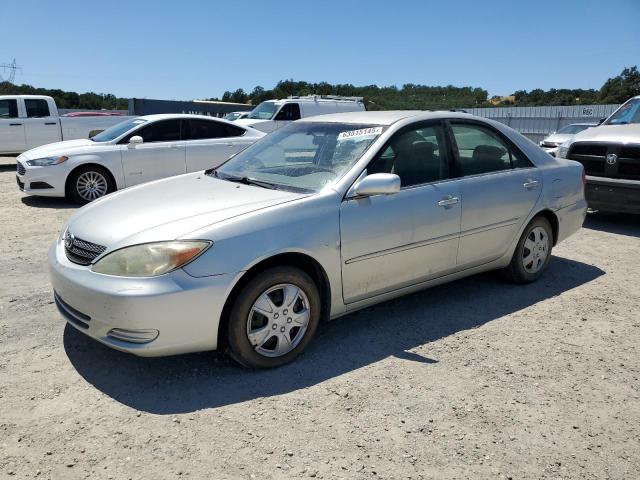 TOYOTA CAMRY LE 2002 silver sedan 4d gas JTDBE32K520074513 photo #1