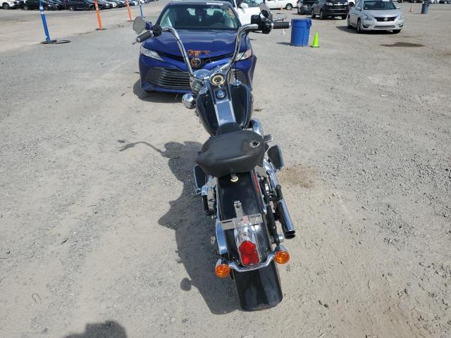 2011 HARLEY-DAVIDSON FLSTN 1HD1JD519BB047561
