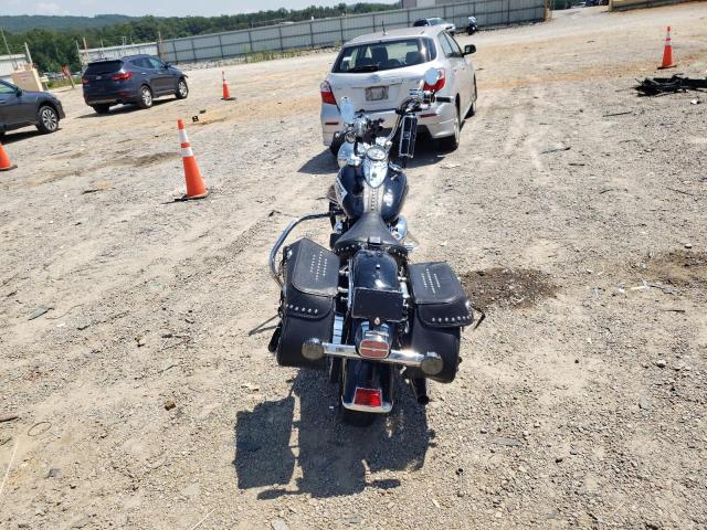 2011 HARLEY-DAVIDSON FLSTC 1HD1BW518BB043042