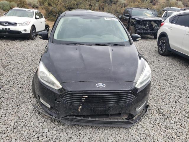 2017 FORD FOCUS TITANIUM 1FADP3J21HL279828
