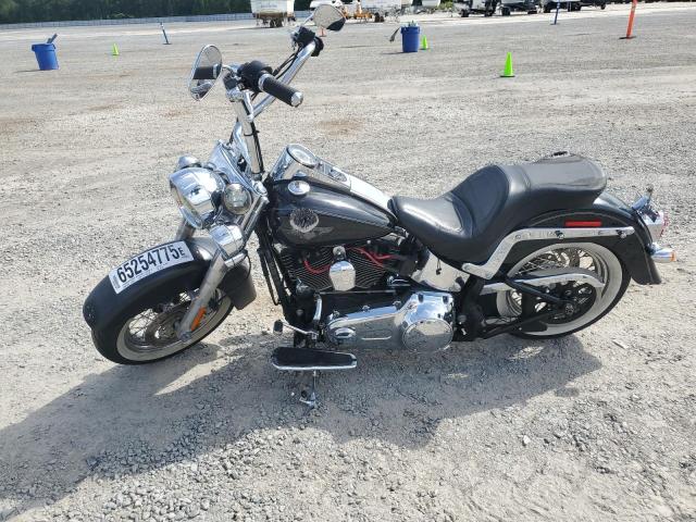 2011 HARLEY-DAVIDSON FLSTN 1HD1JD519BB047561