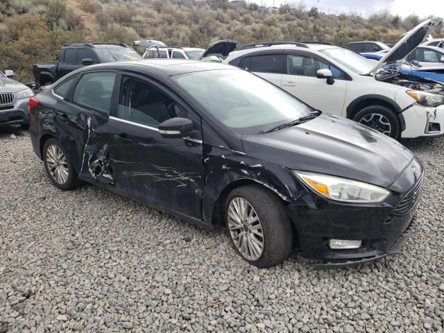 2017 FORD FOCUS TITANIUM 1FADP3J21HL279828