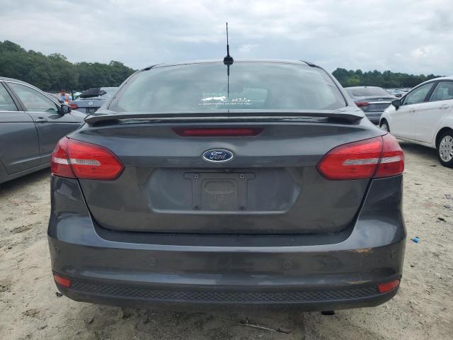 2015 FORD FOCUS TITA 1FADP3J21FL360776