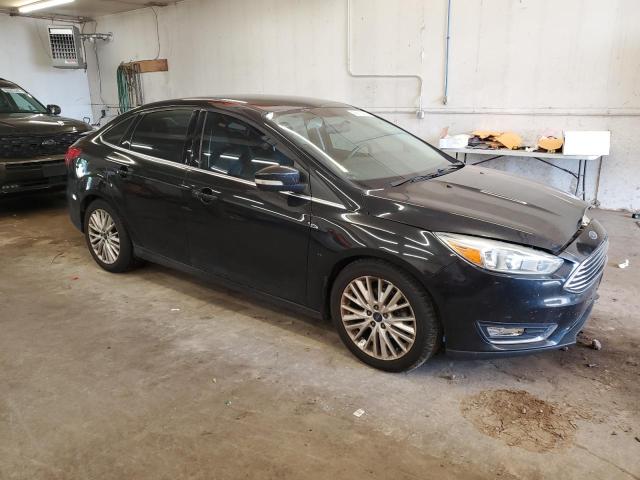 2015 FORD FOCUS TITA 1FADP3J24FL348993
