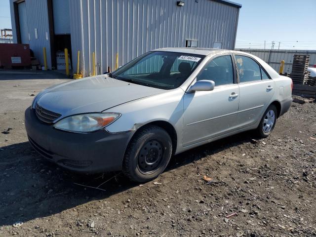 TOYOTA CAMRY LE 2002 silver  gas JTDBE32K720123887 photo #1