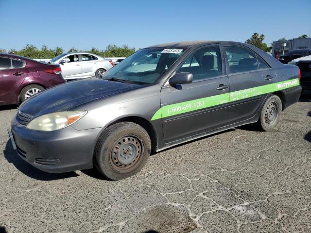 TOYOTA CAMRY LE 2002 gray  gas JTDBE32K020093213 photo #1