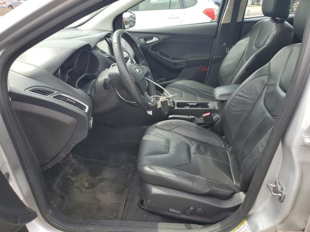 2015 FORD FOCUS TITA 1FADP3J23FL280296
