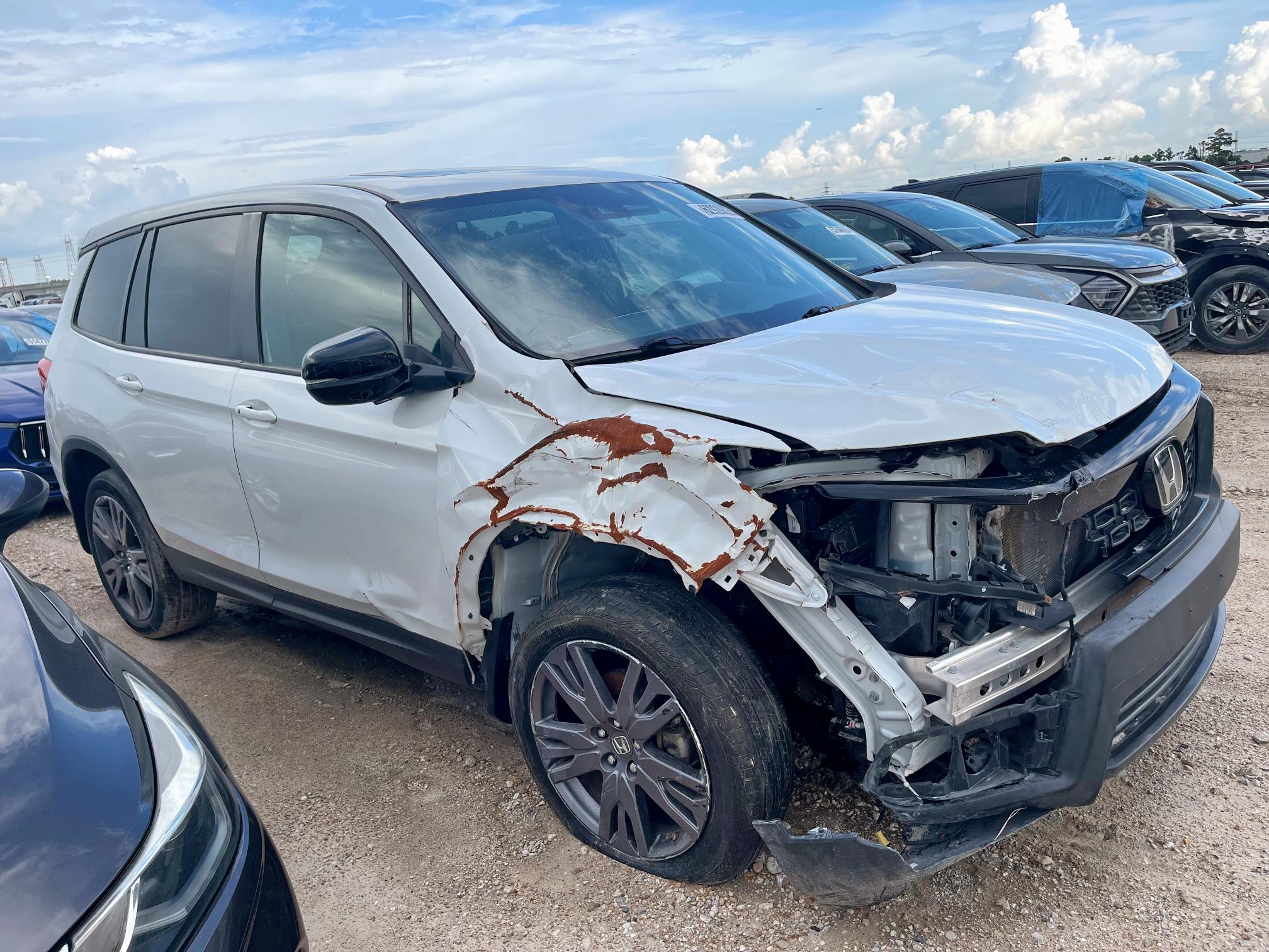 2021 HONDA PASSPORT E 5FNYF8H55MB041554