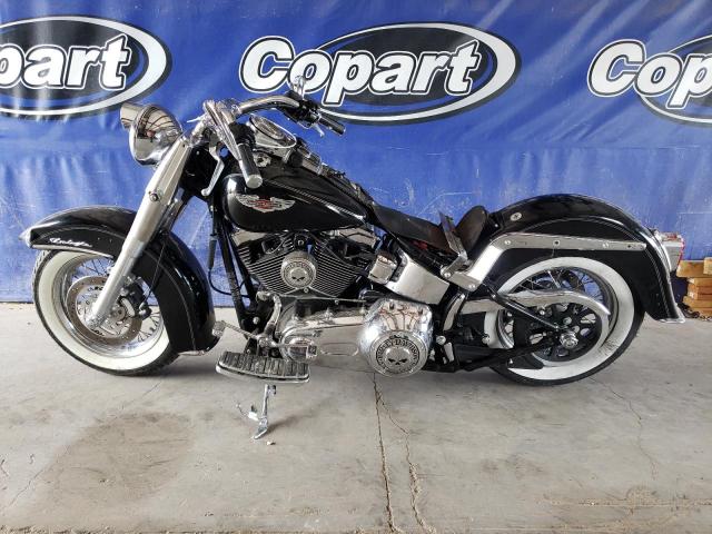 2010 HARLEY-DAVIDSON FLSTN 1HD1JD510AB020151
