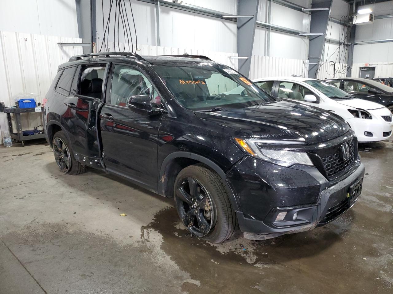 2020 Honda Passport Elite vin: 5FNYF8H0XLB004180