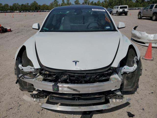 5YJ3E1EA3MF921562 Tesla Model 3  5