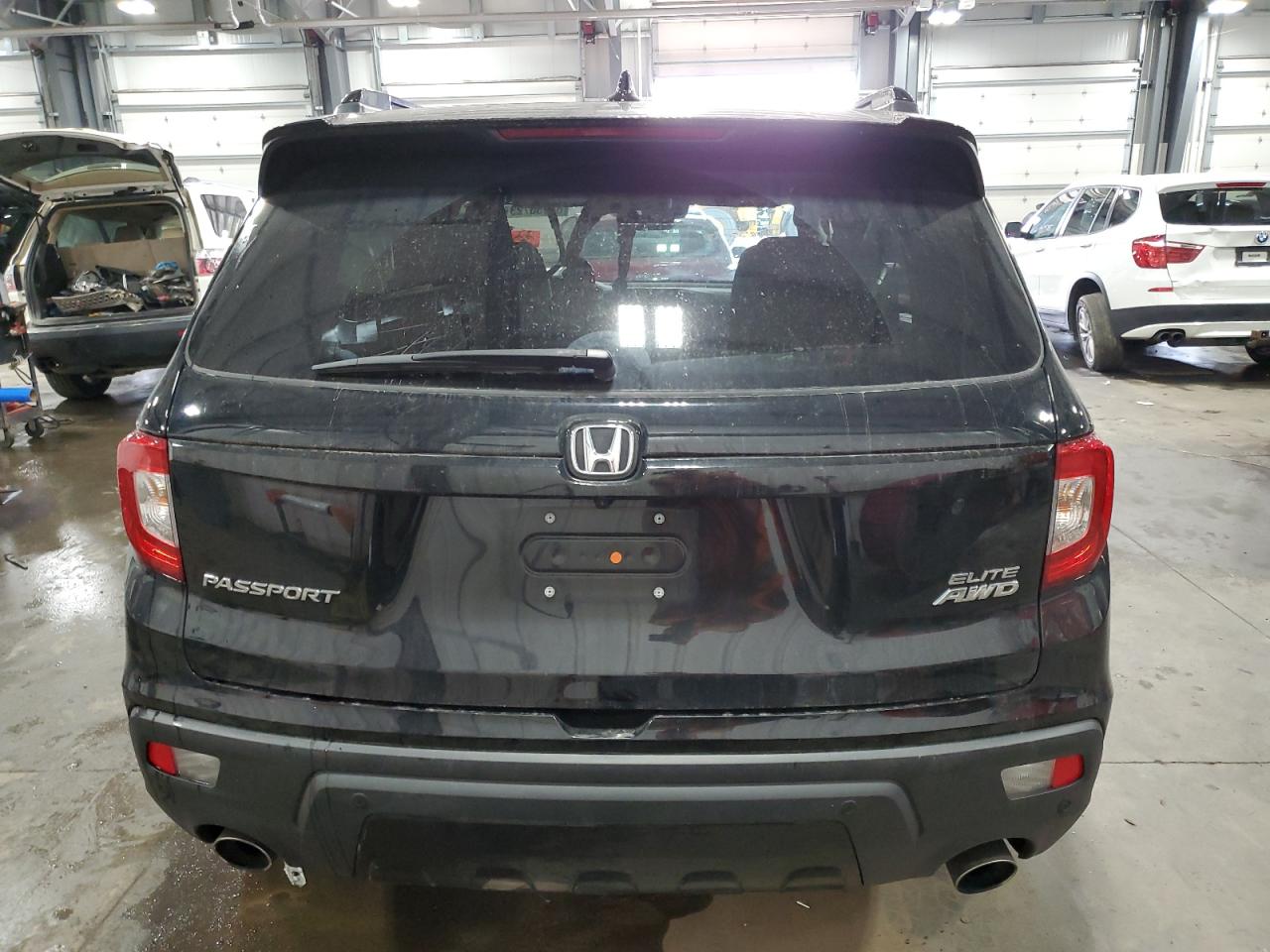 2020 Honda Passport Elite vin: 5FNYF8H0XLB004180