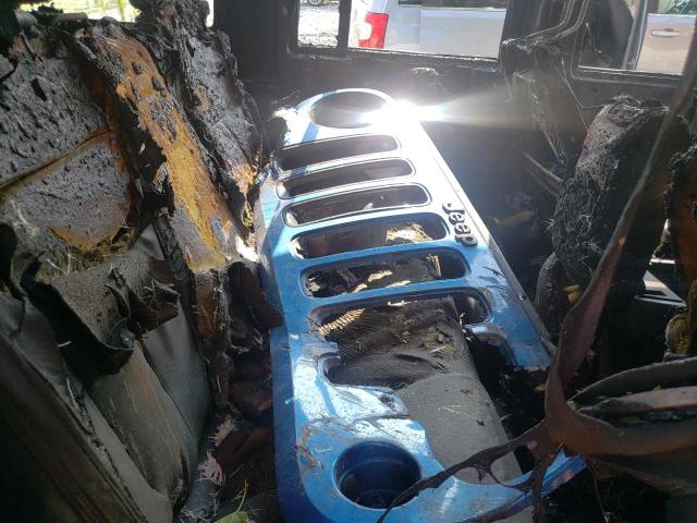 1C4HJWEG9EL236872 Jeep Wrangler Unlimited Sahara