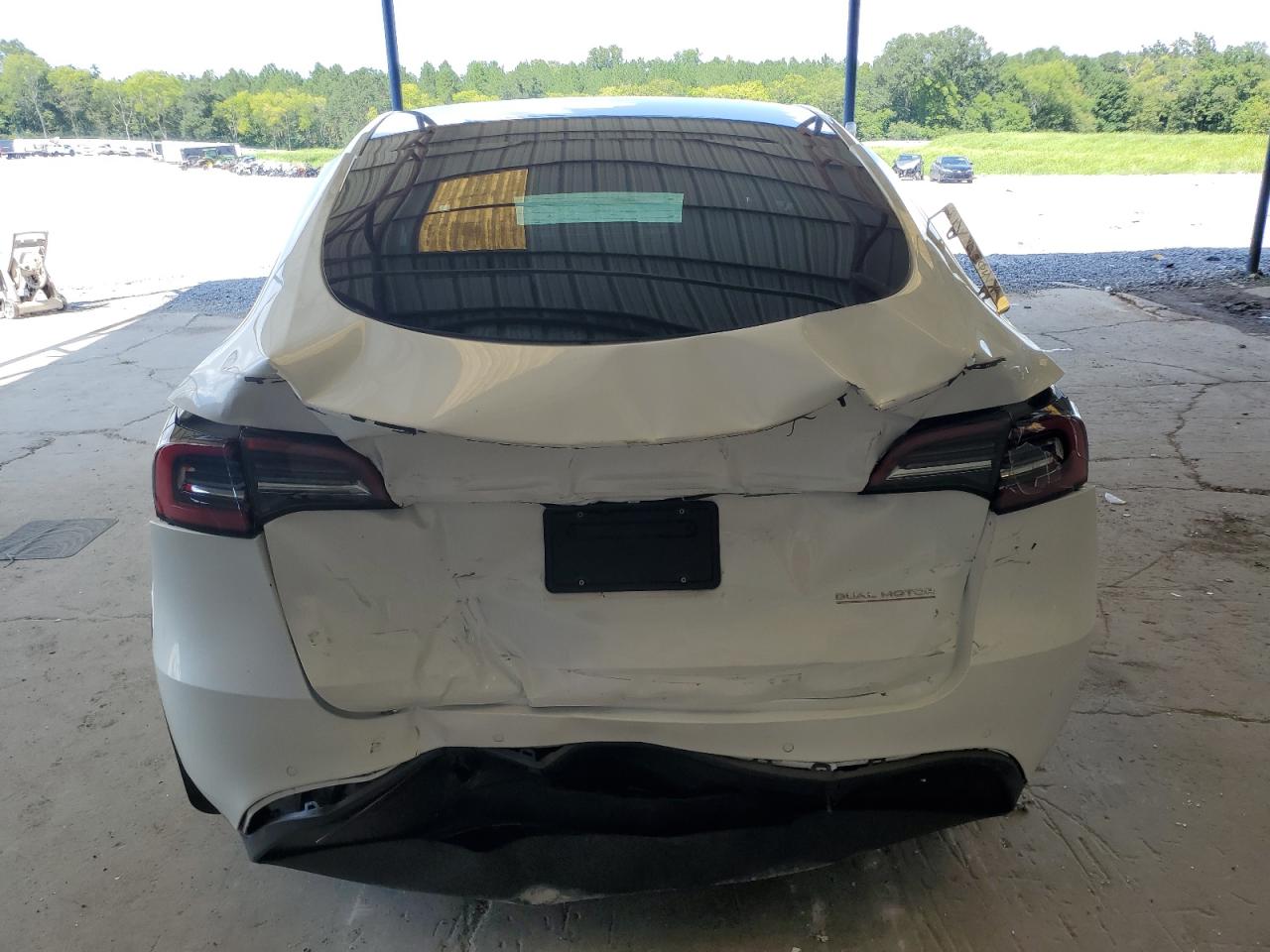 7SAYGDEF7NF438304 Tesla Model Y  6