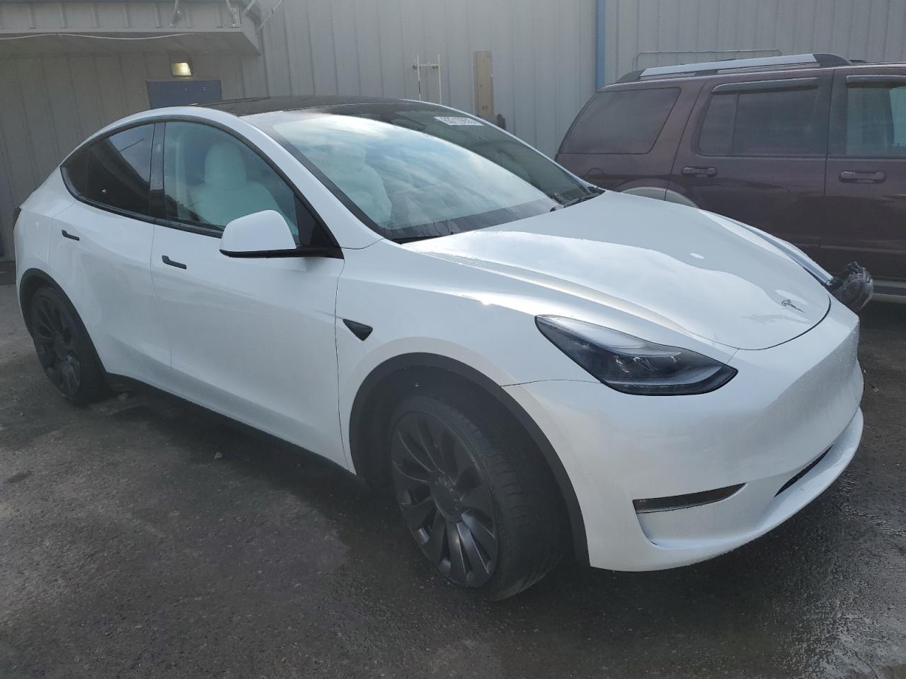 7SAYGDEFXPF806834 Tesla Model Y  4