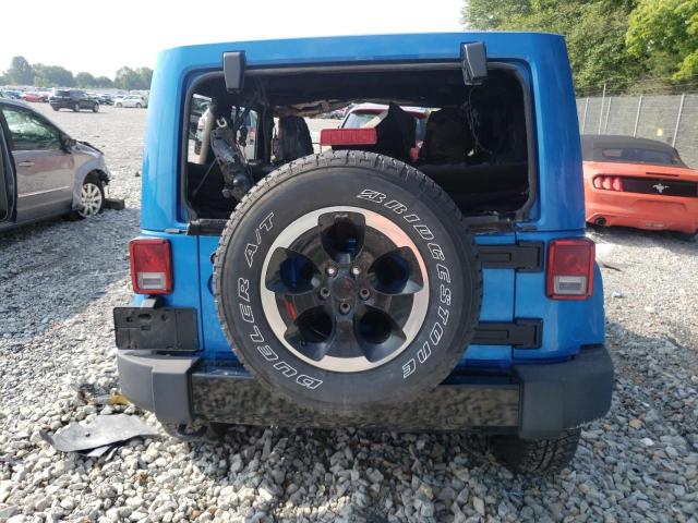 1C4HJWEG9EL236872 Jeep Wrangler Unlimited Sahara