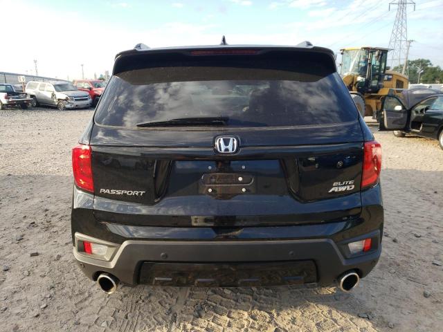 5FNYF8H09NB008224 Honda Passport E 6