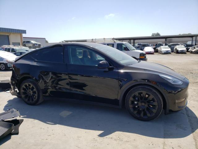 5YJYGDEEXMF092557 Tesla Model Y  4