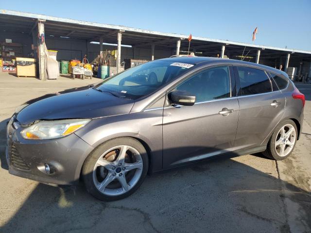 VIN 1FADP3N21EL198415 2014 Ford Focus, Titanium no.1