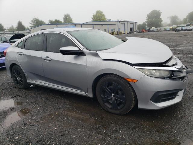 Vin: 2hgfc2f59gh519569, lot: 66390554, honda civic lx 20164