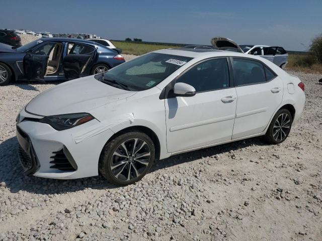 VIN 5YFBURHE3HP613054 2017 Toyota Corolla, L no.1