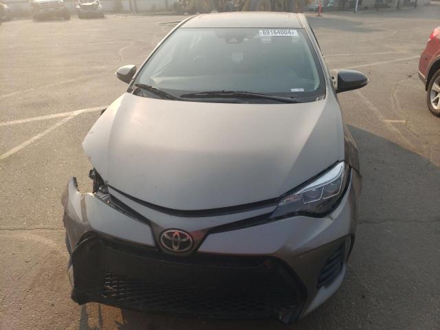 VIN 5YFBURHE5JP851221 2018 Toyota Corolla, L no.5