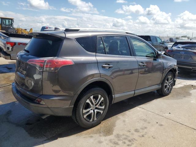 VIN JTMZFREV1JJ165338 2018 Toyota RAV4, LE no.3