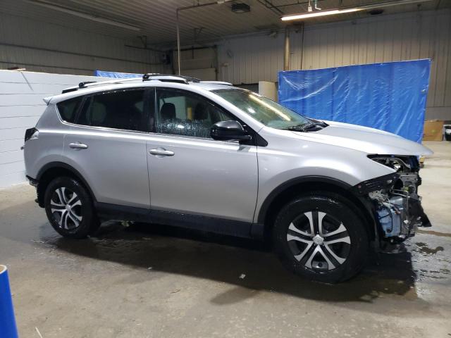 VIN JTMBFREV4JJ260056 2018 Toyota RAV4, LE no.4