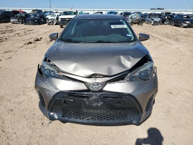 VIN 5YFBURHE8HP677722 2017 Toyota Corolla, L no.5