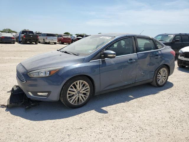 VIN 1FADP3J28JL279539 2018 Ford Focus, Titanium no.1