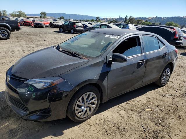 VIN 5YFBURHE2KP881293 2019 Toyota Corolla, L no.1