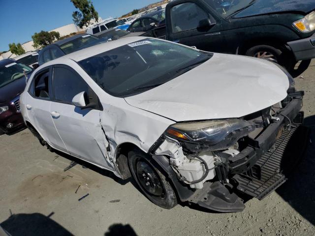 VIN 5YFBURHE9HP669239 2017 Toyota Corolla, L no.4