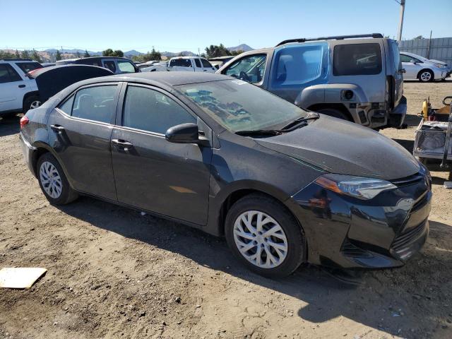 VIN 5YFBURHE2KP881293 2019 Toyota Corolla, L no.4