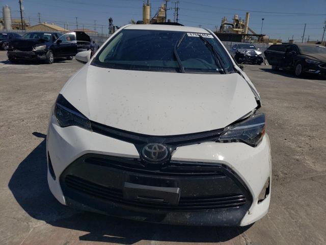 VIN 5YFBURHE0JP818742 2018 Toyota Corolla, L no.5