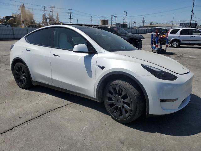 VIN 7SAYGAEE8NF559042 2022 Tesla MODEL Y no.4