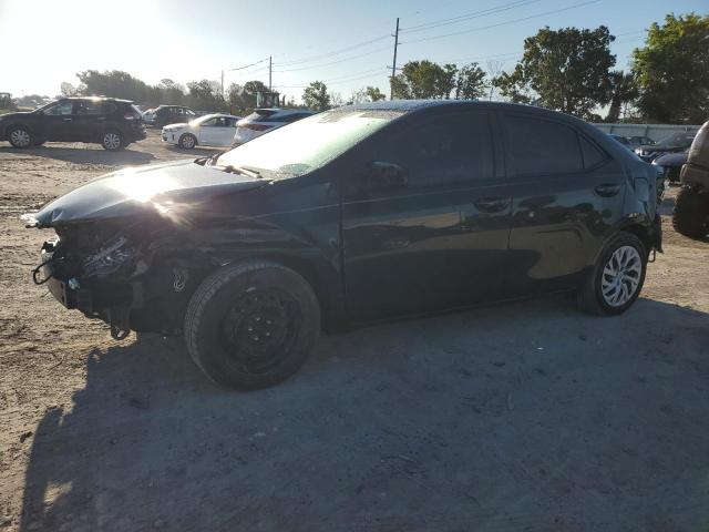 VIN 5YFBURHE5KP860406 2019 Toyota Corolla, L no.1