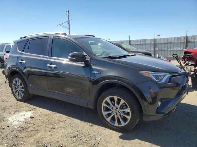 VIN JTMDJREV2JD162956 2018 Toyota RAV4, Limited no.4