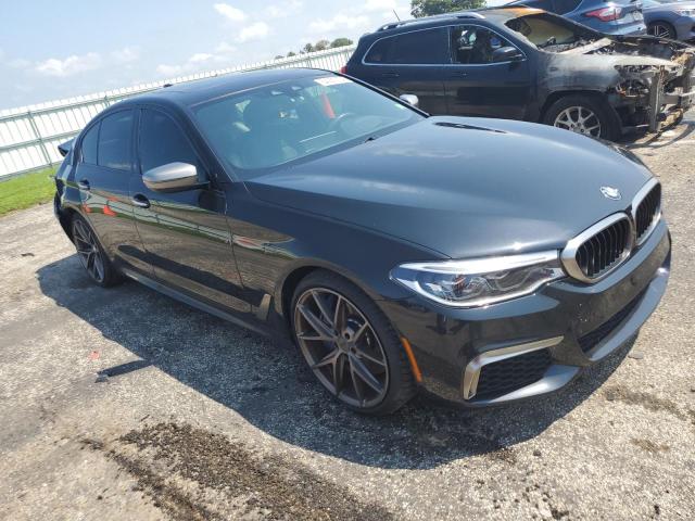 VIN WBAJB9C59JB036573 2018 BMW 5 Series, M550XI no.4