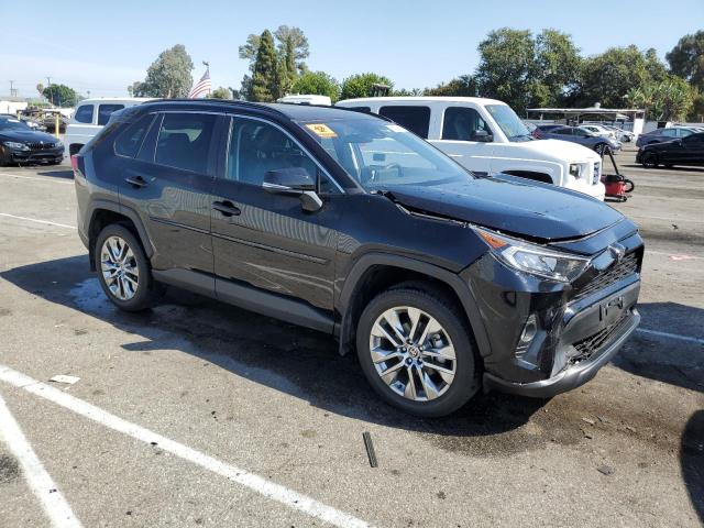 VIN 2T3C1RFV8MC145095 2021 Toyota RAV4, Xle Premium no.4