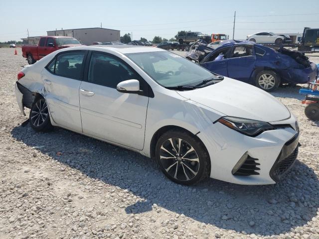 VIN 5YFBURHE3HP613054 2017 Toyota Corolla, L no.4