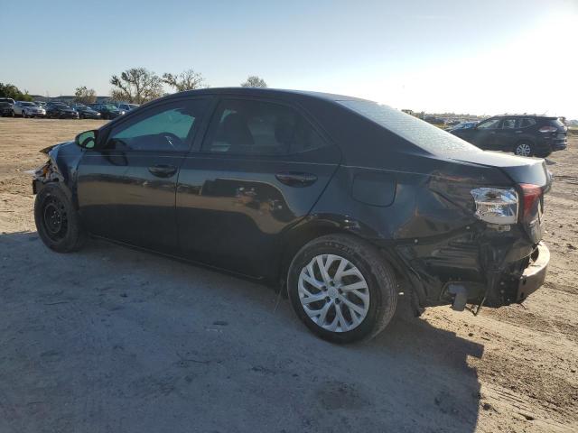 VIN 5YFBURHE5KP860406 2019 Toyota Corolla, L no.2