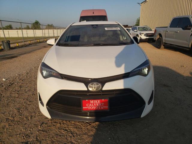 VIN 5YFBURHE4JP743690 2018 Toyota Corolla, L no.5