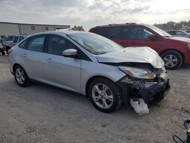 VIN 1FADP3F22DL371498 2013 Ford Focus, SE no.4