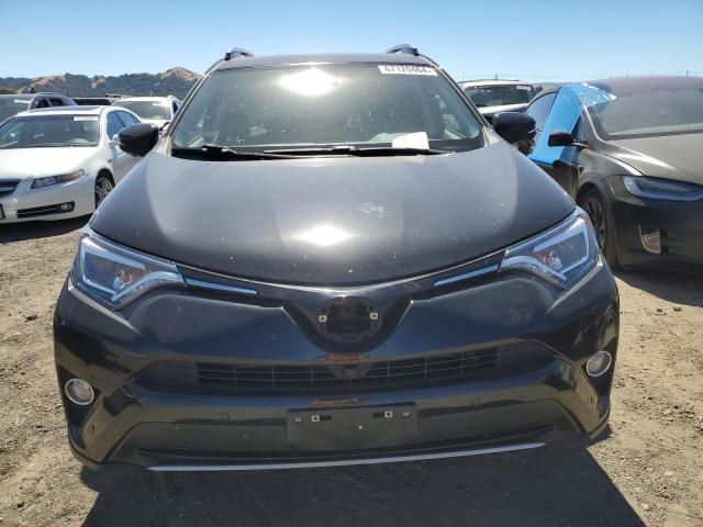 VIN JTMDJREV2JD162956 2018 Toyota RAV4, Limited no.5