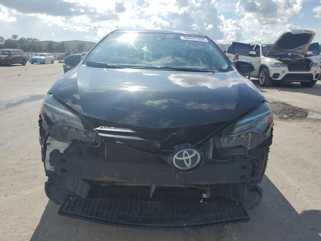 VIN 5YFBURHE4JP754169 2018 Toyota Corolla, L no.5