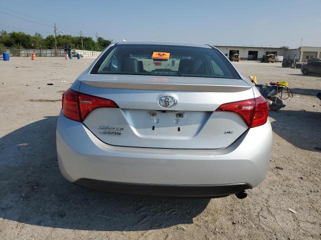 VIN 5YFBURHEXHP597113 2017 Toyota Corolla, L no.6